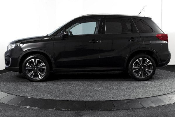 Suzuki Vitara 1.4 Boosterjet 140 PK Stijl Org. NL. | Afn. Trekhaak | Adapt. Cruise | Stoelverw. | PDC | Camera | NAV + App. Connect  | ECC | LM 17" |