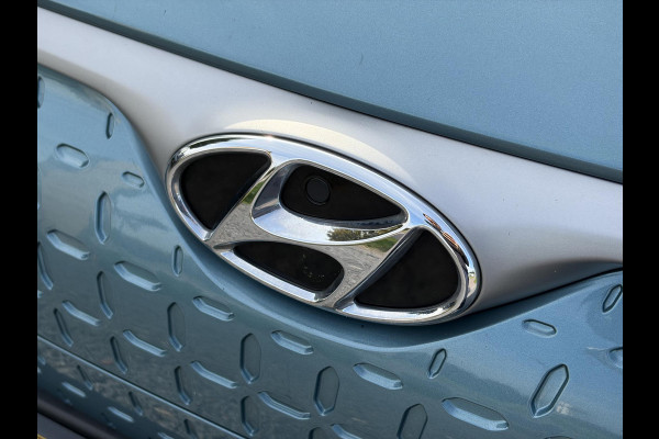Hyundai Kona EV Premium 64 kWh ✓Soh 93.2 %✓2e Eigenaar✓Carplay✓Camera✓Navi✓Keyless✓Halfleder✓Rijstrooksensor✓Dodehoeksensor✓Pdc V+A✓Lm velgen✓Clima✓Cruise✓204pk✓N.A.P✓Apk tot 09-2027