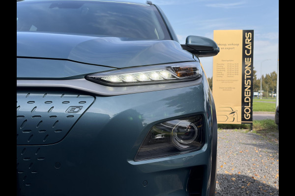 Hyundai Kona EV Premium 64 kWh ✓Soh 93.2 %✓2e Eigenaar✓Carplay✓Camera✓Navi✓Keyless✓Halfleder✓Rijstrooksensor✓Dodehoeksensor✓Pdc V+A✓Lm velgen✓Clima✓Cruise✓204pk✓N.A.P✓Apk tot 09-2027