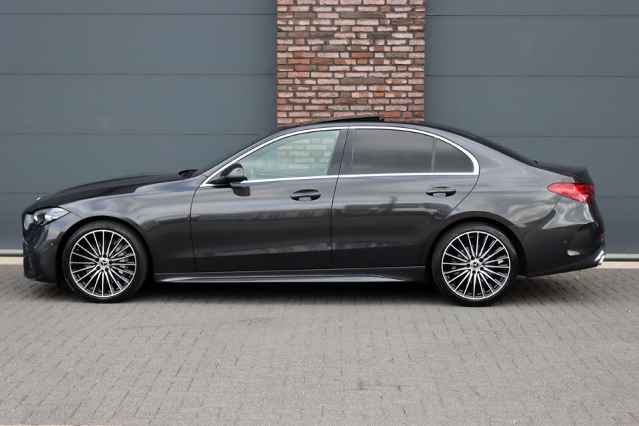 Mercedes-Benz C-Klasse 200 AMG Line | Panoramadak | Distronic+ | Camera | Sfeerverlichting Premium | Zitcomfortpakket | Stoelverwarminig | Geluidsisolerend Glas |
