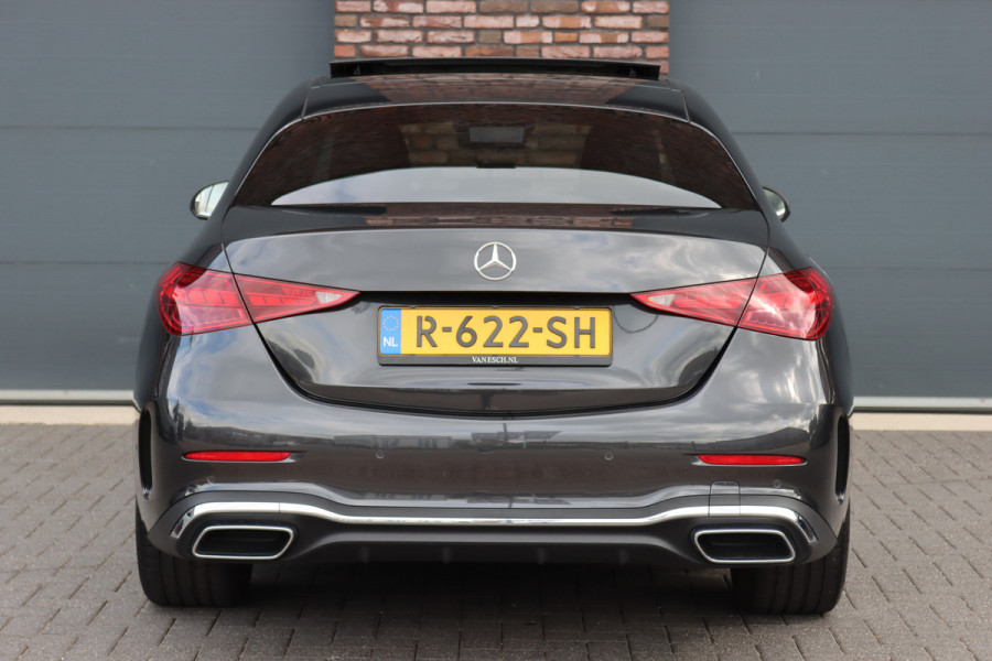 Mercedes-Benz C-Klasse 200 AMG Line | Panoramadak | Distronic+ | Camera | Sfeerverlichting Premium | Zitcomfortpakket | Stoelverwarminig | Geluidsisolerend Glas |