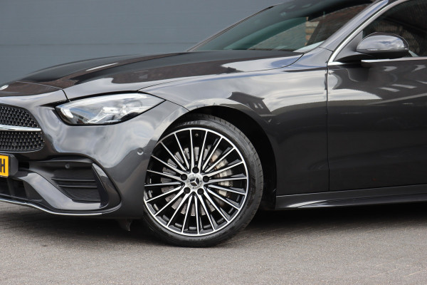 Mercedes-Benz C-Klasse 200 AMG Line | Panoramadak | Distronic+ | Camera | Sfeerverlichting Premium | Zitcomfortpakket | Stoelverwarminig | Geluidsisolerend Glas |