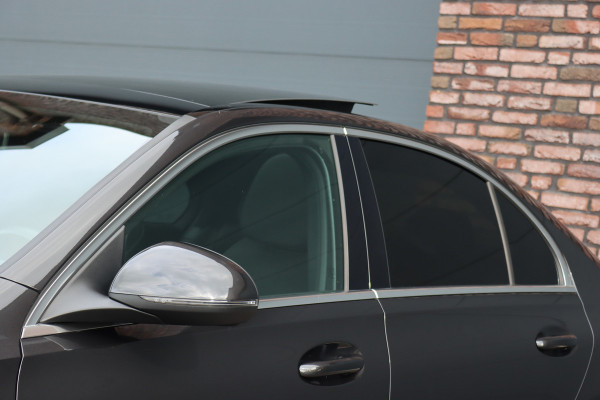Mercedes-Benz C-Klasse 200 AMG Line | Panoramadak | Distronic+ | Camera | Sfeerverlichting Premium | Zitcomfortpakket | Stoelverwarminig | Geluidsisolerend Glas |