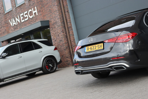 Mercedes-Benz C-Klasse 200 AMG Line | Panoramadak | Distronic+ | Camera | Sfeerverlichting Premium | Zitcomfortpakket | Stoelverwarminig | Geluidsisolerend Glas |