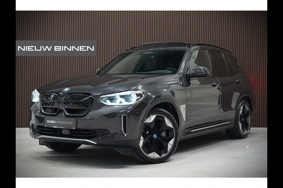BMW iX3 High Executive 80 kWh | Panoramadak | Harman Kardon | Head-Up Display | Adaptive Cruise Control | Stoelverwarming | Dodehoekdetectie | Keyless | Trekhaak | 360 Camera | Ambiance Verlichting |