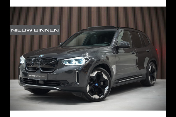 BMW iX3 High Executive 80 kWh | Panoramadak | Harman Kardon | Head-Up Display | Adaptive Cruise Control | Stoelverwarming | Dodehoekdetectie | Keyless | Trekhaak | 360 Camera | Ambiance Verlichting |