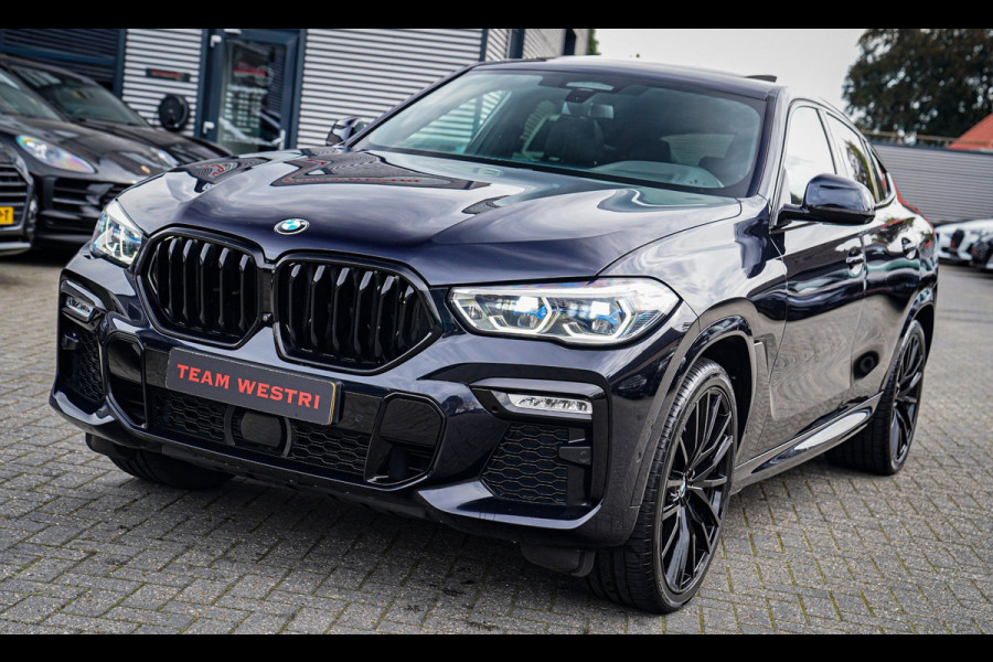 BMW X6 XDrive40i High Executive | Panorama | 360cam | Carbon | Adaptieve cruise control | Kristallen pook | 22 inch | Dealer onder