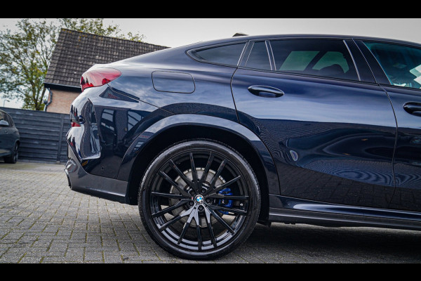 BMW X6 XDrive40i High Executive | Panorama | 360cam | Carbon | Adaptieve cruise control | Kristallen pook | 22 inch | Dealer onder