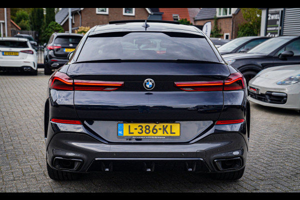 BMW X6 XDrive40i High Executive | Panorama | 360cam | Carbon | Adaptieve cruise control | Kristallen pook | 22 inch | Dealer onder