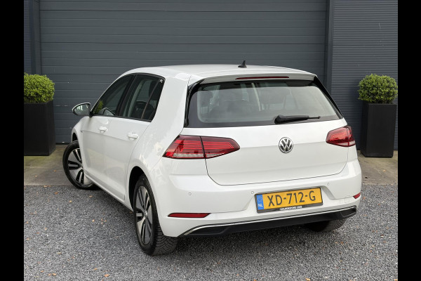 Volkswagen e-Golf e-Golf ✓SOH 85,18 %✓2e Eigenaar✓Carplay✓Navi✓Clima✓Cruise✓Pdc V+A✓136pk✓Lm velgen✓Bj 12-2018✓N.A.P✓Apk tot 10-2027