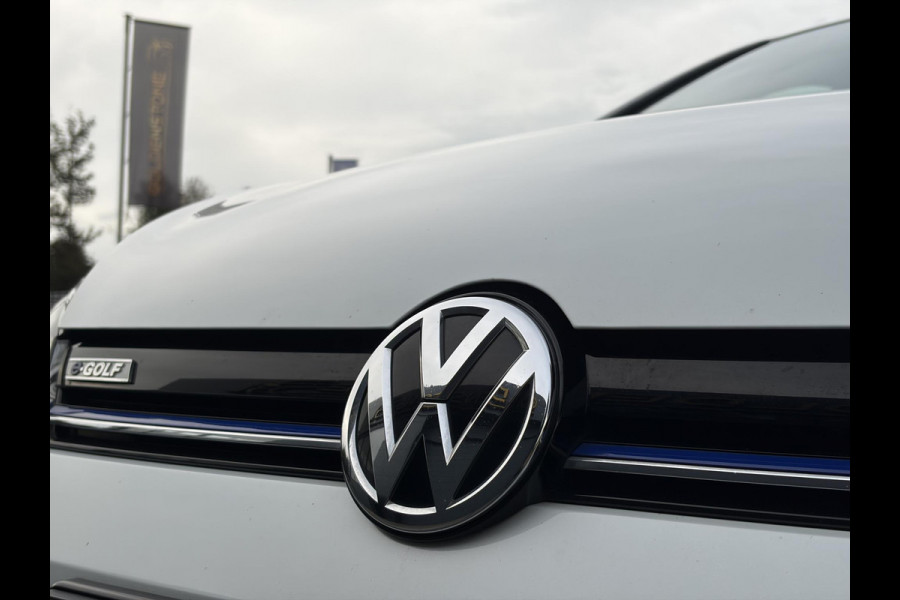 Volkswagen e-Golf e-Golf ✓SOH 85,18 %✓2e Eigenaar✓Carplay✓Navi✓Clima✓Cruise✓Pdc V+A✓136pk✓Lm velgen✓Bj 12-2018✓N.A.P✓Apk tot 10-2027