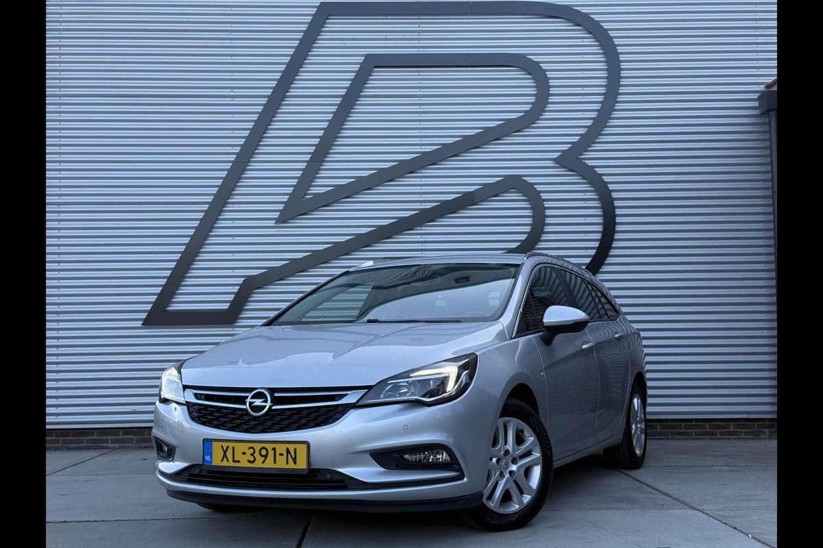 Opel Astra Sports Tourer 1.4 Turbo Online Edition 2e Eigenaar|Navi|Trekhaak|Clima|Cruise|Carplay|PDC|Elek ramen|N.A.P|APK tot 01-2027