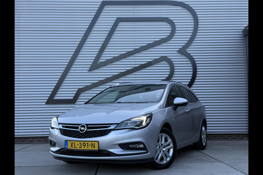 Opel Astra Sports Tourer 1.4 Turbo Online Edition 2e Eigenaar|Navi|Trekhaak|Clima|Cruise|Carplay|PDC|Elek ramen|N.A.P|APK tot 01-2027