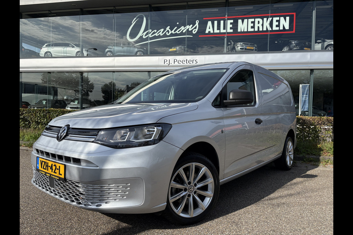 Volkswagen Caddy Cargo Maxi 2.0 TDI Comfort Airco - Apple carplay - Parkeersensor achter - Zijschuifdeur rechts - Tussenschot volledig - Zijwandbekleding laadruimte - Cruise control - Bluetooth - Start/stop systeem - Elektrische ramen - Stuur multifunctioneel - Regensensor