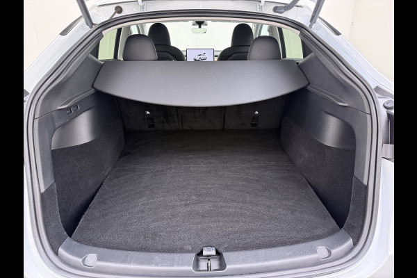 Tesla Model Y RWD 300PK SOH 90% Trekhaak Warmtepomp LFP-Accu Premium-Audio AMD Ryzen™ Camera's Navi Ecc Led Lmv 19" Privacy Glas Leder Stoel+Stuurverwarming Panoramadak Bluetooth Elek.Achterklep 1.600KG Trekgewicht 1e Eigenaar Origineel Nederlandse Auto