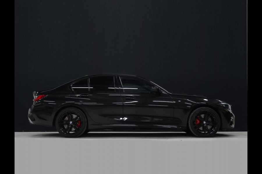 BMW 3-serie 320e High Executive M sport [SOH 91%, APPLE CARPLAY, ANDROID, BMW LASERLIGHT, STOELVERWARMING, VOL LEDER, PDC V+A, CRUISE CONTROL, DIGITAL DASH, CLIMATE CONTROL, NIEUWSTAAT]
