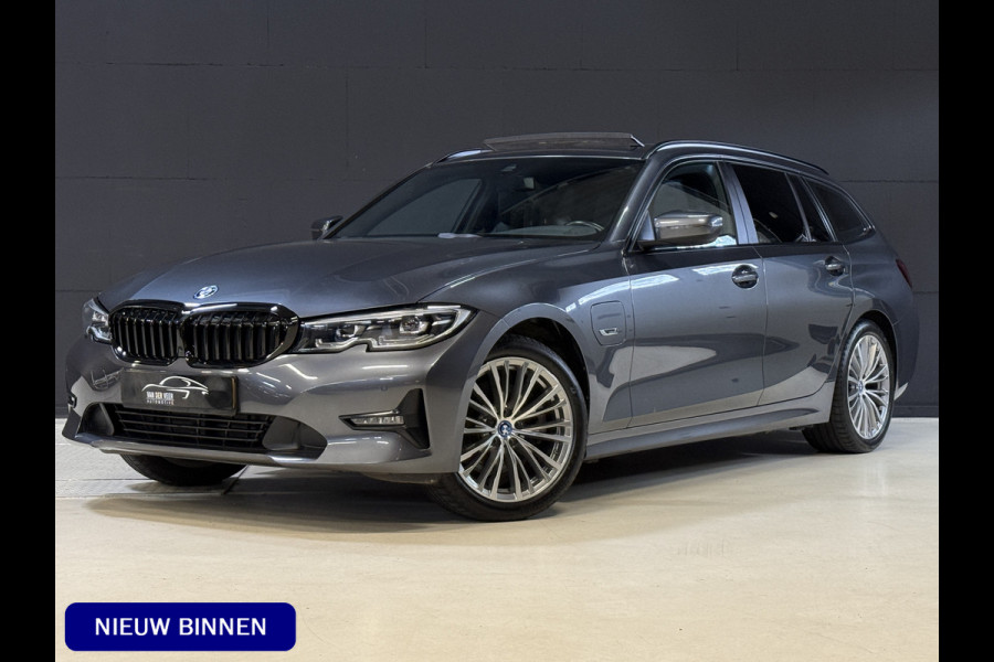BMW 3 Serie Touring 320e Business Edition Plus | Panoramadak | Wegkl. trekhaak | Vol leder