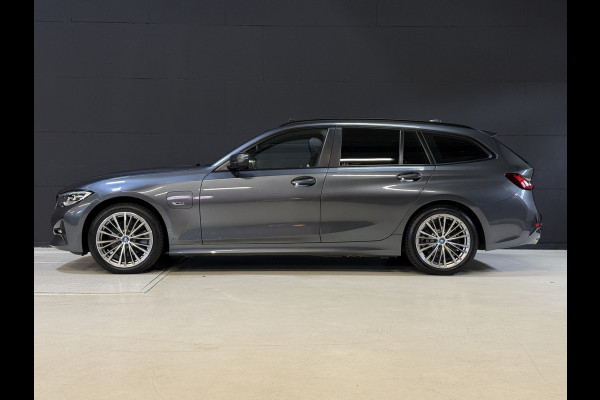 BMW 3 Serie Touring 320e Business Edition Plus | Panoramadak | Wegkl. trekhaak | Vol leder