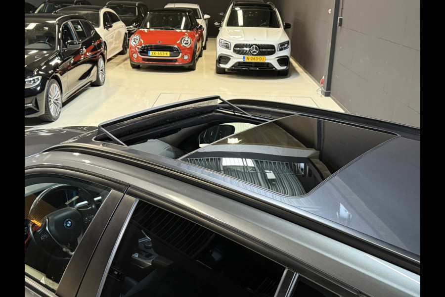BMW 3 Serie Touring 320e Business Edition Plus | Panoramadak | Wegkl. trekhaak | Vol leder