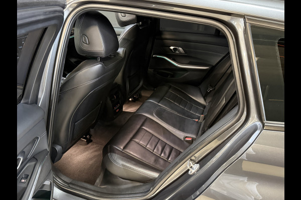 BMW 3 Serie Touring 320e Business Edition Plus | Panoramadak | Wegkl. trekhaak | Vol leder