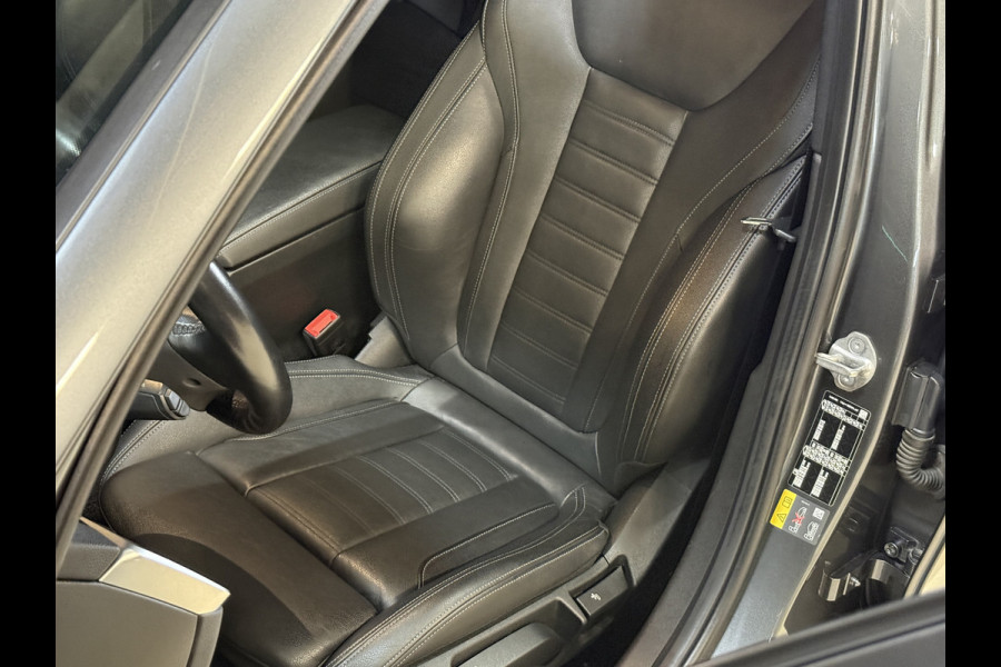 BMW 3 Serie Touring 320e Business Edition Plus | Panoramadak | Wegkl. trekhaak | Vol leder