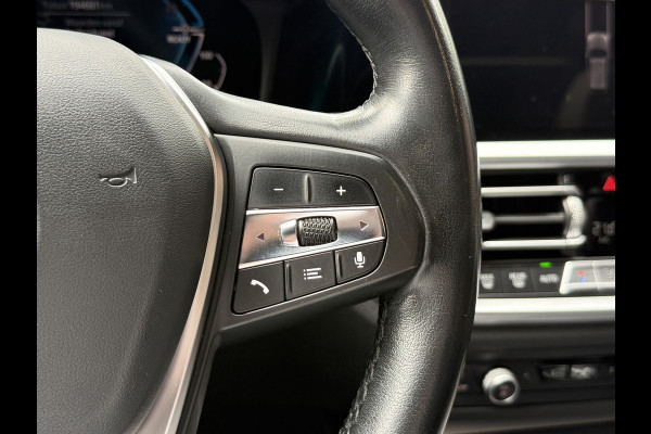 BMW 3 Serie Touring 320e Business Edition Plus | Panoramadak | Wegkl. trekhaak | Vol leder