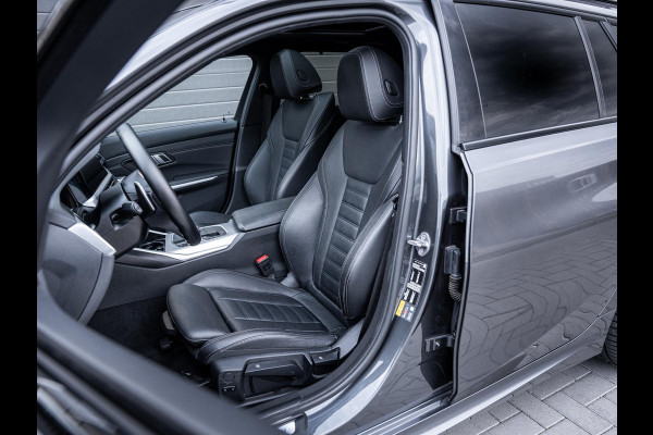 BMW 3 Serie Touring 320e High Executive M-Sport l Pano l ACC | Trekhaak l 360cam l ACC