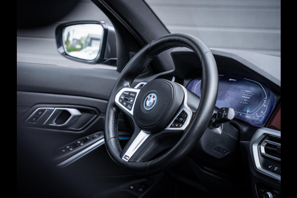 BMW 3 Serie Touring 320e High Executive M-Sport l Pano l ACC | Trekhaak l 360cam l ACC