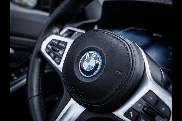 BMW 3 Serie Touring 320e High Executive M-Sport l Pano l ACC | Trekhaak l 360cam l ACC