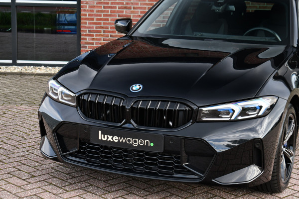 BMW 3 Serie Touring 330e xDrive LCI-2 Pano El-zetels HUD 360-cam Trekhaak