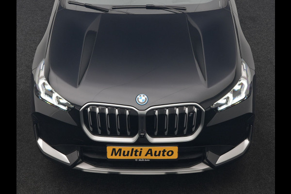 BMW iX1 xDrive30 67 kWh 313pk Dealer O.H. | Adaptive Cruise | Head Up | 360 Camera | Harman / Kardon | Lederen Comfortstoelen Massage & Memory | Keyless | Blis | Sfeerverlichting | Stoelverwarming | Apple Carplay | Navigatie | DAB |
