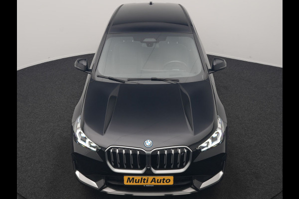 BMW iX1 xDrive30 67 kWh 313pk Dealer O.H. | Adaptive Cruise | Head Up | 360 Camera | Harman / Kardon | Lederen Comfortstoelen Massage & Memory | Keyless | Blis | Sfeerverlichting | Stoelverwarming | Apple Carplay | Navigatie | DAB |