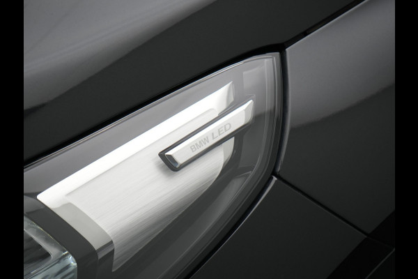 BMW iX1 xDrive30 67 kWh 313pk Dealer O.H. | Adaptive Cruise | Head Up | 360 Camera | Harman / Kardon | Lederen Comfortstoelen Massage & Memory | Keyless | Blis | Sfeerverlichting | Stoelverwarming | Apple Carplay | Navigatie | DAB |