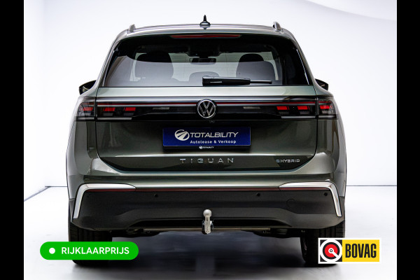 Volkswagen Tiguan 1.5 eHybrid Elegance | Elec. trekhaak | HUD | Pano dak | Stoel- stuur- & achterbankverw. | IQ Led | Adap. Cruise | Massagestoelen, Sfeerverlichting, Navigatie, App. connect, Spraakbediening, 19"LMV, Cipressino Green Metallic