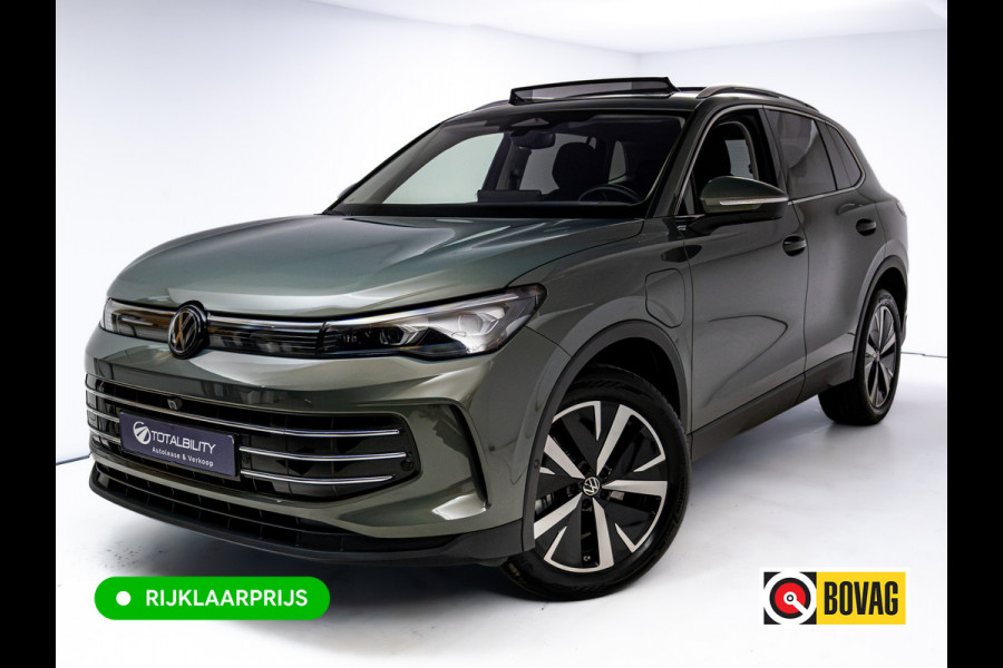Volkswagen Tiguan 1.5 eHybrid Elegance | Elec. trekhaak | HUD | Pano dak | Stoel- stuur- & achterbankverw. | IQ Led | Adap. Cruise | Massagestoelen, Sfeerverlichting, Navigatie, App. connect, Spraakbediening, 19"LMV, Cipressino Green Metallic