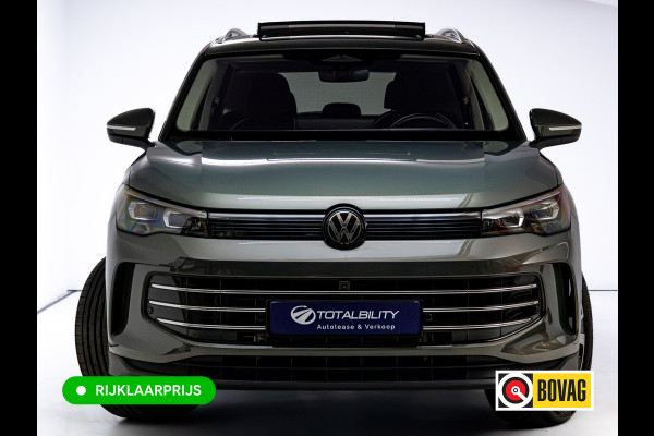 Volkswagen Tiguan 1.5 eHybrid Elegance | Elec. trekhaak | HUD | Pano dak | Stoel- stuur- & achterbankverw. | IQ Led | Adap. Cruise | Massagestoelen, Sfeerverlichting, Navigatie, App. connect, Spraakbediening, 19"LMV, Cipressino Green Metallic