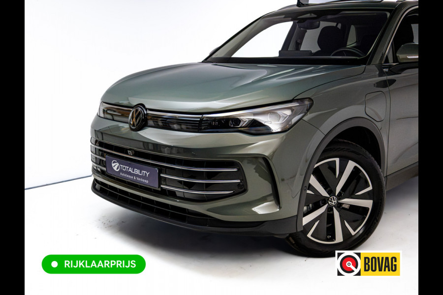 Volkswagen Tiguan 1.5 eHybrid Elegance | Elec. trekhaak | HUD | Pano dak | Stoel- stuur- & achterbankverw. | IQ Led | Adap. Cruise | Massagestoelen, Sfeerverlichting, Navigatie, App. connect, Spraakbediening, 19"LMV, Cipressino Green Metallic