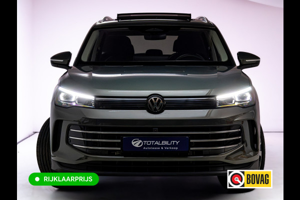 Volkswagen Tiguan 1.5 eHybrid Elegance | Elec. trekhaak | HUD | Pano dak | Stoel- stuur- & achterbankverw. | IQ Led | Adap. Cruise | Massagestoelen, Sfeerverlichting, Navigatie, App. connect, Spraakbediening, 19"LMV, Cipressino Green Metallic