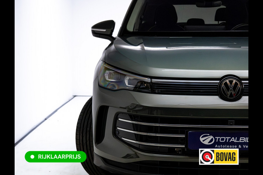 Volkswagen Tiguan 1.5 eHybrid Elegance | Elec. trekhaak | HUD | Pano dak | Stoel- stuur- & achterbankverw. | IQ Led | Adap. Cruise | Massagestoelen, Sfeerverlichting, Navigatie, App. connect, Spraakbediening, 19"LMV, Cipressino Green Metallic