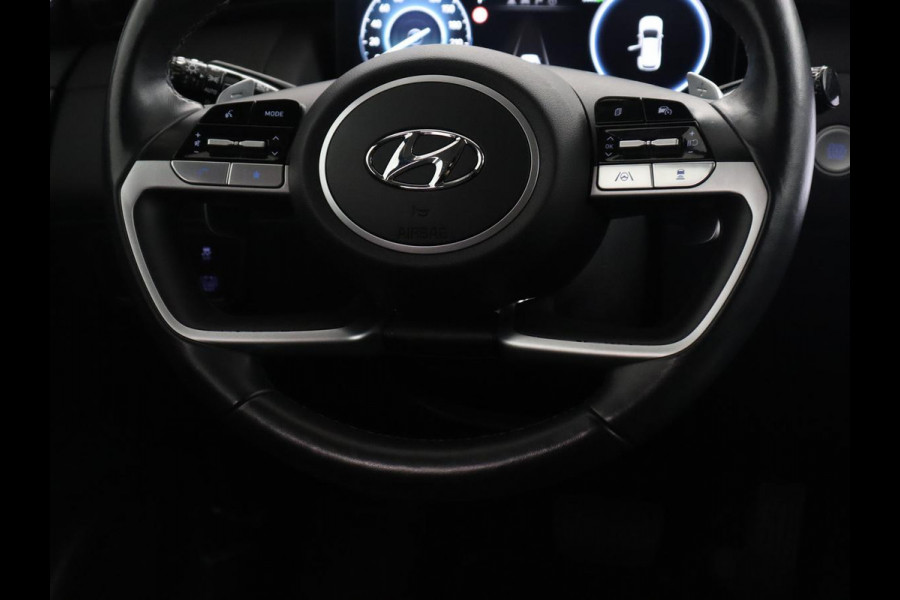 Hyundai Tucson 1.6 T-GDI HEV Premium | Leder | Stoelkoeling | Trekhaak | 360 camera | Adaptive cruise | Carplay | Krell Sound | Memory | Stuur/stoelverwarming |
