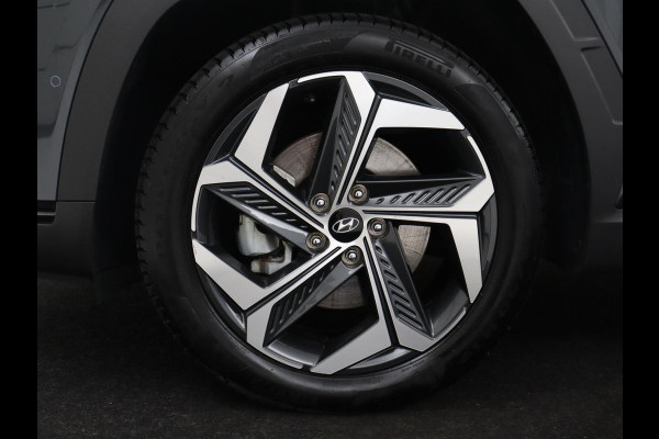 Hyundai Tucson 1.6 T-GDI HEV Premium | Leder | Stoelkoeling | Trekhaak | 360 camera | Adaptive cruise | Carplay | Krell Sound | Memory | Stuur/stoelverwarming |