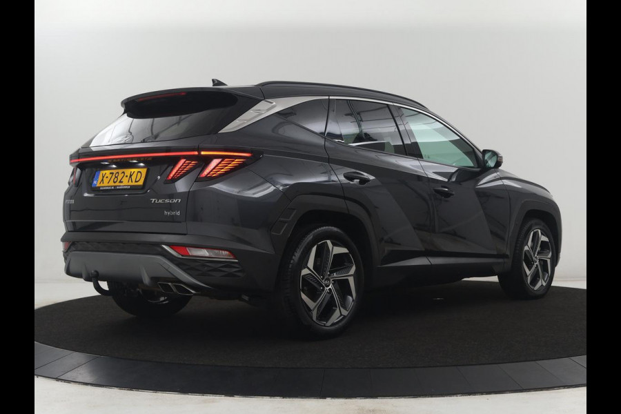 Hyundai Tucson 1.6 T-GDI HEV Premium | Leder | Stoelkoeling | Trekhaak | 360 camera | Adaptive cruise | Carplay | Krell Sound | Memory | Stuur/stoelverwarming |