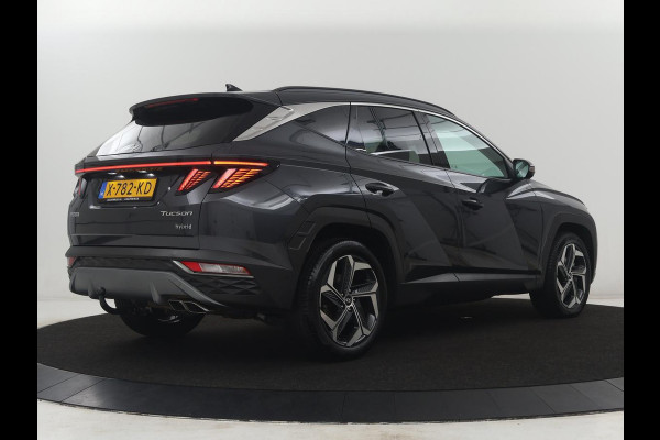 Hyundai Tucson 1.6 T-GDI HEV Premium | Leder | Stoelkoeling | Trekhaak | 360 camera | Adaptive cruise | Carplay | Krell Sound | Memory | Stuur/stoelverwarming |