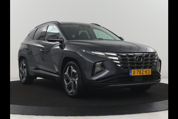 Hyundai Tucson 1.6 T-GDI HEV Premium | Leder | Stoelkoeling | Trekhaak | 360 camera | Adaptive cruise | Carplay | Krell Sound | Memory | Stuur/stoelverwarming |