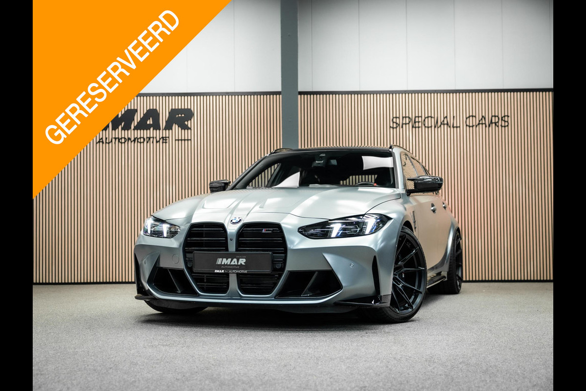 BMW 3 Serie Touring M3 xDrive Competition | Frozen Pure Grey II | WheelForce Velgen | Head-Up Display | Harman Kardon |