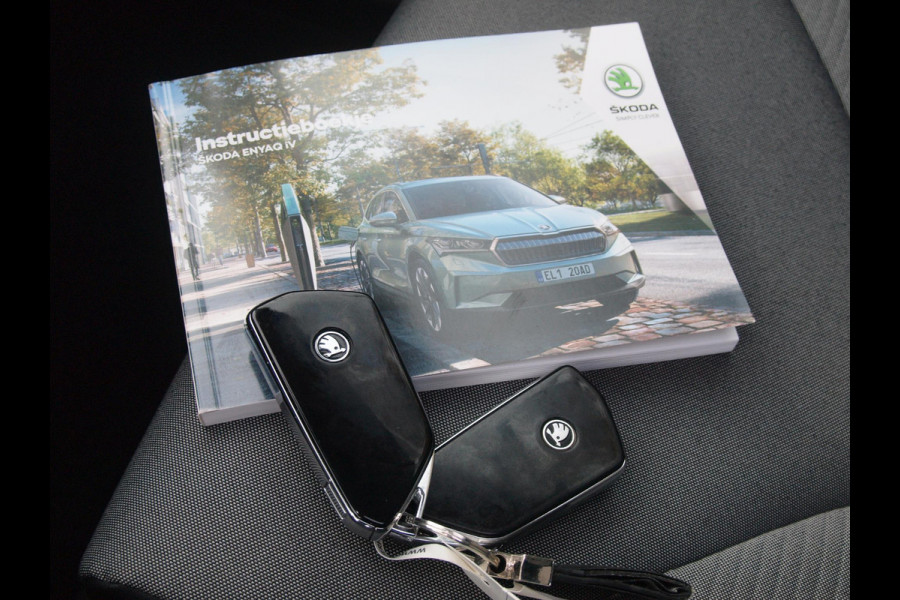 Škoda ENYAQ iV 80 | Panoramadak | Trekhaak | Camera | Warmtepomp | Sfeerverlichting | ACC | NL-Auto |