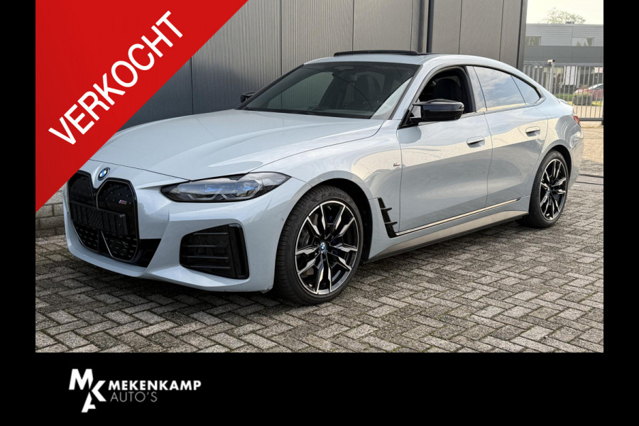 BMW i4 M50 High Executive 84 kWh 19"/SOH 99%/Schuif-kanteldak/Trekhaak/Leder + memory/Stoel + stuurverwarming/Harman Kardon/Dodehoek/Adaptieve cruise/Keyless/360 camera