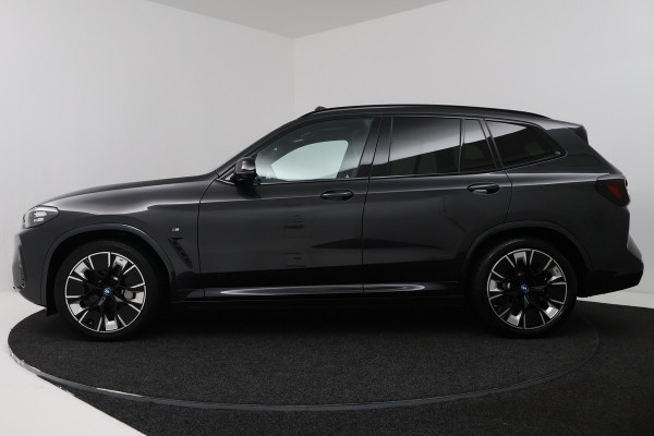BMW iX3 High Executive 80 kWh (SOH 98%, PANORAMADAK, TREKHAAK, CRUISE CONTROL ADAPTIEF, CAMERA, STOELVERWARMING)