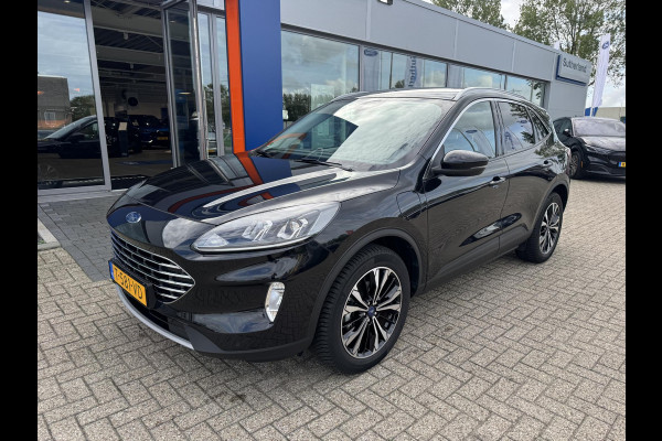 Ford Kuga 2.5 PHEV Titanium 225pk | Winterpack | Trekhaak | Verlengde fabrieksgarantie tot 14-09-2031 (max 160.000km) | Michelin Cross Climate | 1.500kg Trekgewicht