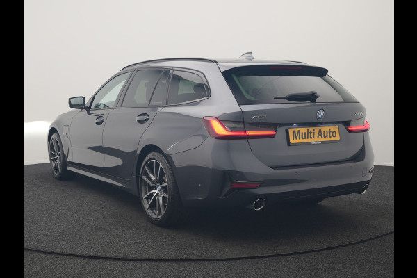 BMW 3 Serie Touring 320e xDrive Sportline PHEV 204pk Dealer O.H | SOH 88,1% | Trekhaak Af Fabriek | Camera | Laser LED | Cruise Control | Lederen Sportstoelen Verwarmd | Keyless | Sfeerverlichting | Apple Carplay | BLIS | Virtual | Navigatie | DAB | 18"L. Plug In Hybrid |